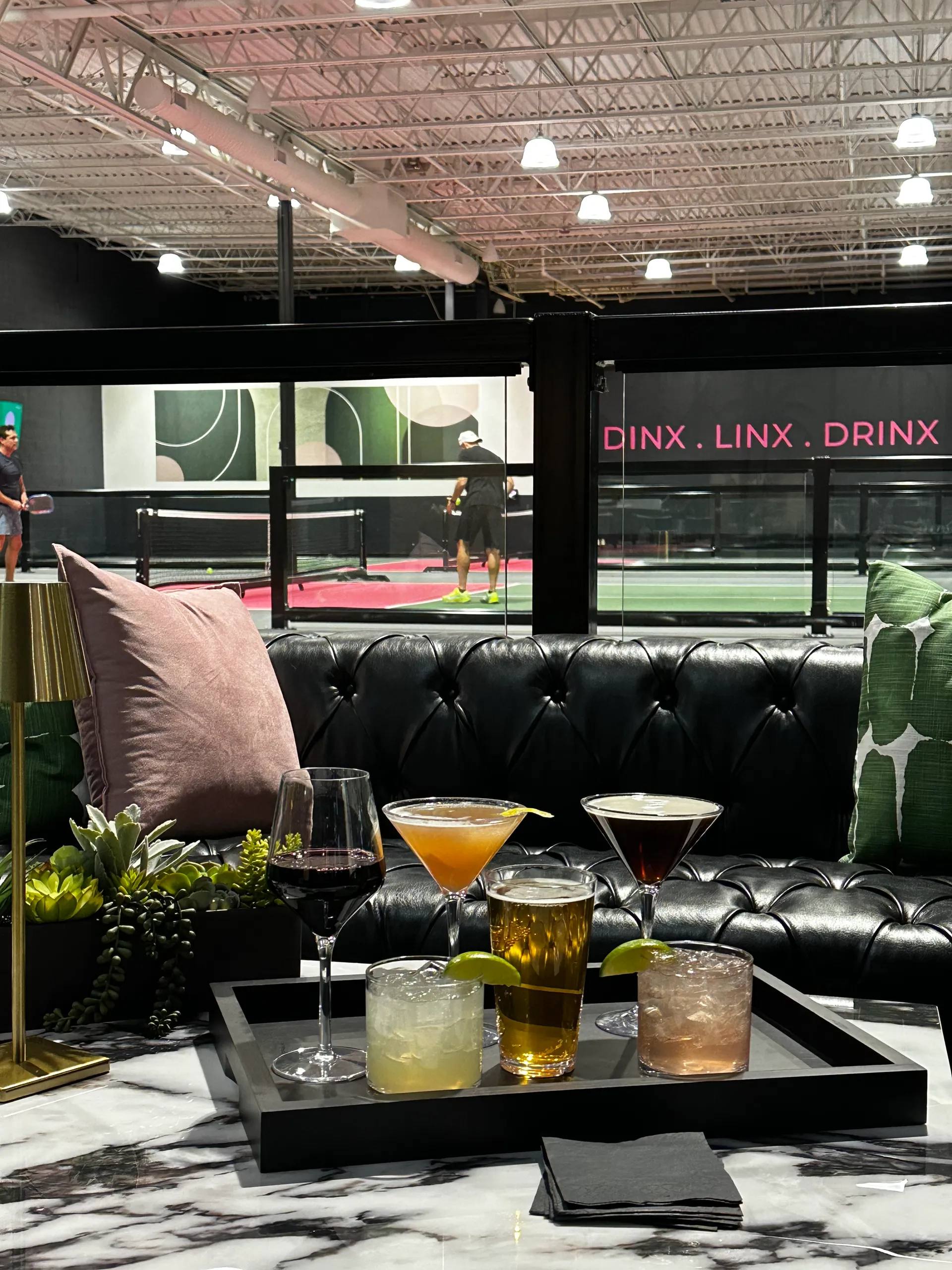 Cocktails courtside at DINX